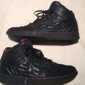 Black and red Jordan 1’s